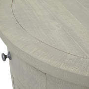 Tömör fenyőfából készült, mosott szürke színű, pácolt kisszekrény.