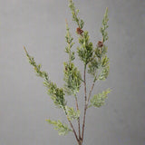 Részletgazdag, többágú jeges borókafenyő mű ág karácsonyi dekorációhoz.