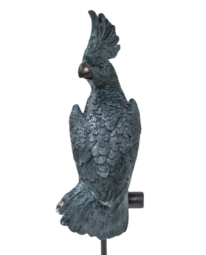 Türkiz színű, dekoratív kakadu figura.
