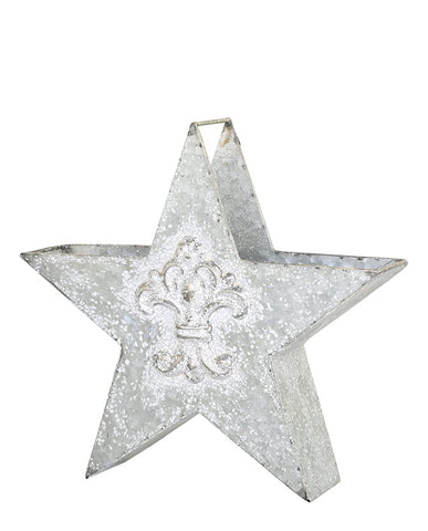 Csillag formájú, bádogból készült karácsonyi dekoráció.