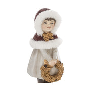 Krémszínű karácsonyi kislány figura.