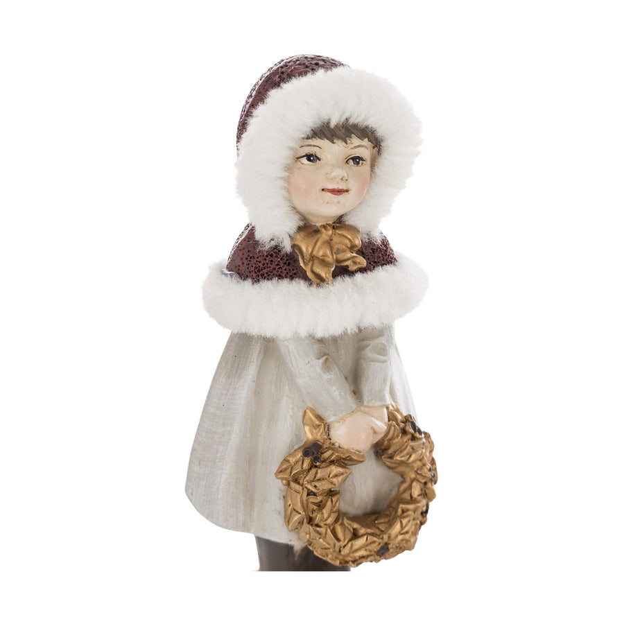 Krémszínű karácsonyi kislány figura.