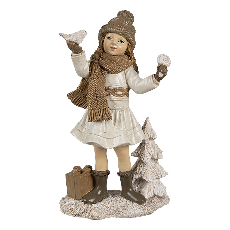 Tradicionális megjelenésű, madárkát tartó, bézs színű karácsonyi kislány.