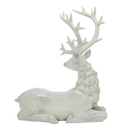 Fehér színű karácsonyi szarvas figura.