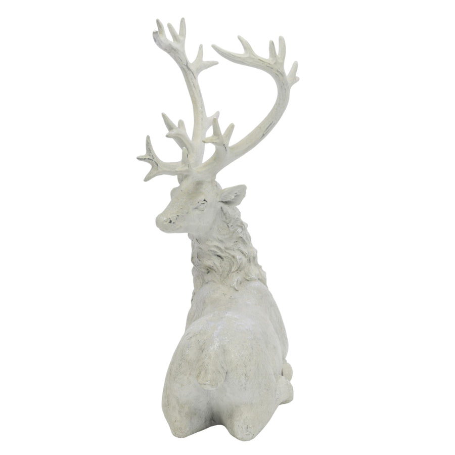 Fehér színű karácsonyi szarvas figura.