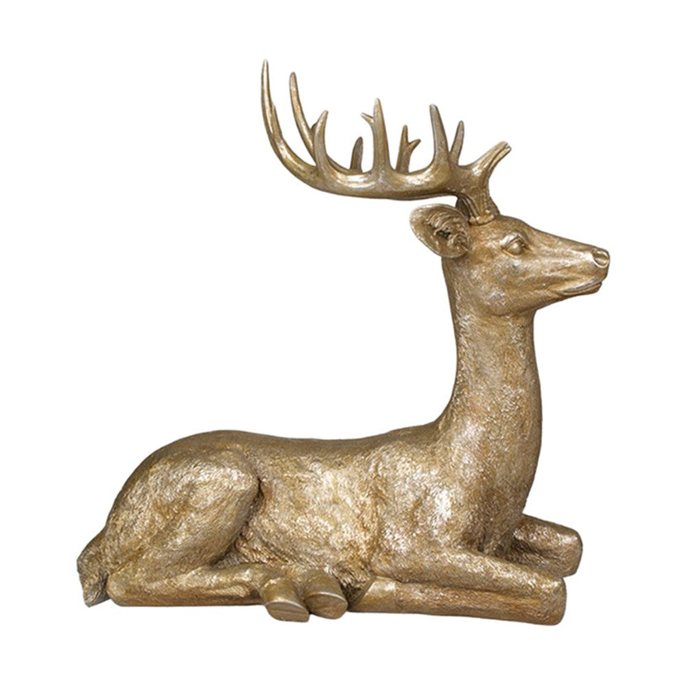 Aranyszínű karácsonyi szarvas figura.