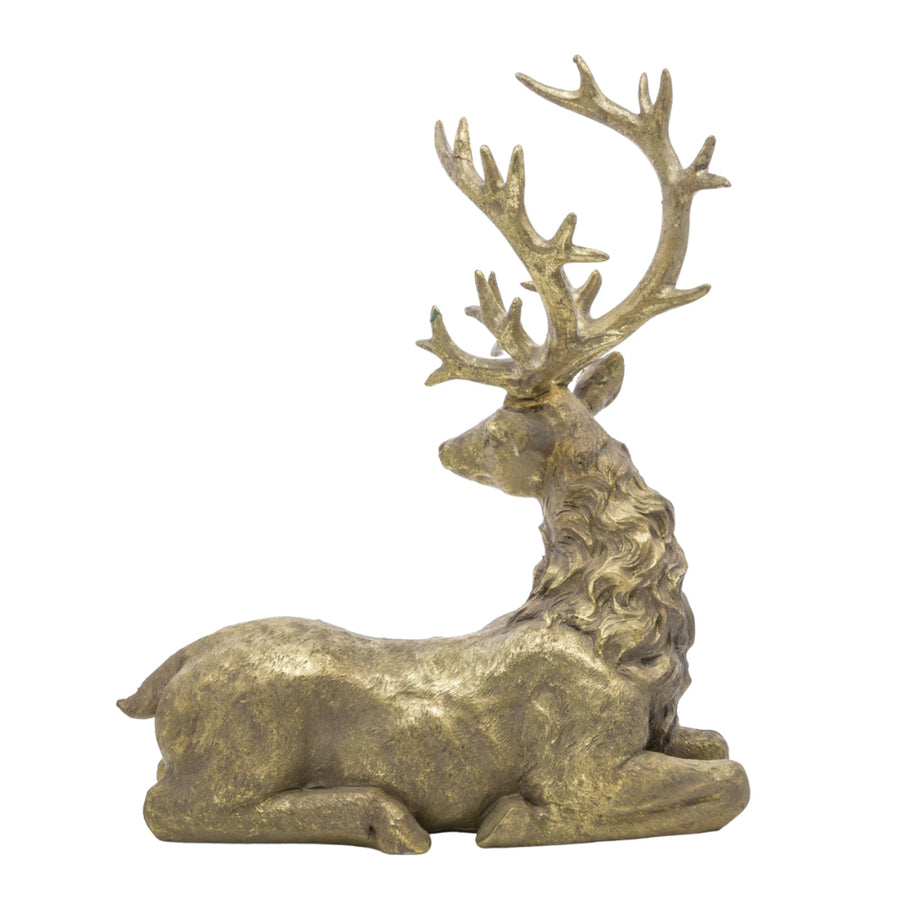 Aranyszínű karácsonyi szarvas figura.
