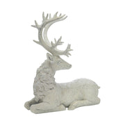 Fehér színű karácsonyi szarvas figura.