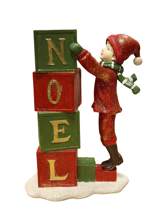 Téli kisfiúval díszített, "Noel" feliratú karácsonyi mécsestartó.