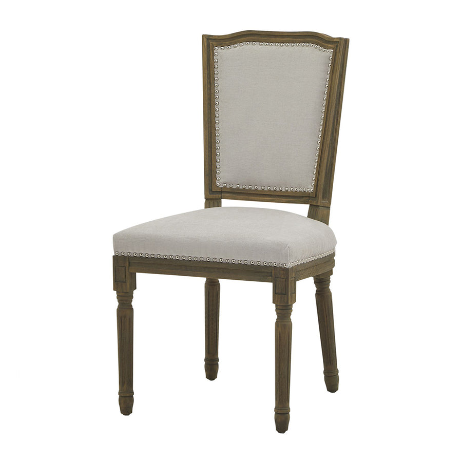 Világosszürke színű szövettel kárpitozott, koloniál stílusú kézműves étkezőszék.