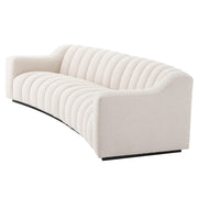Krémszínű buklé szövettel kárpitozott óriás dizájn kanapé.