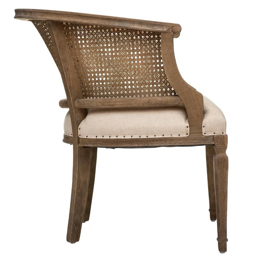 Koloniál stílusú, nyírfából készült, natúr színű rattan háttámlájú fotel.
