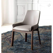 Bézs színű műbőrrel kárpitozott, kőrisfából készült, formatervezett dizájn étkezőszék.