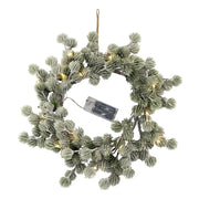 Melegfehér fényű LED-el felszerelt, mű cédrus fenyő koszorú.