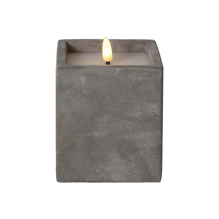 Szürke cement tégelyben kialakított LED gyertya.
