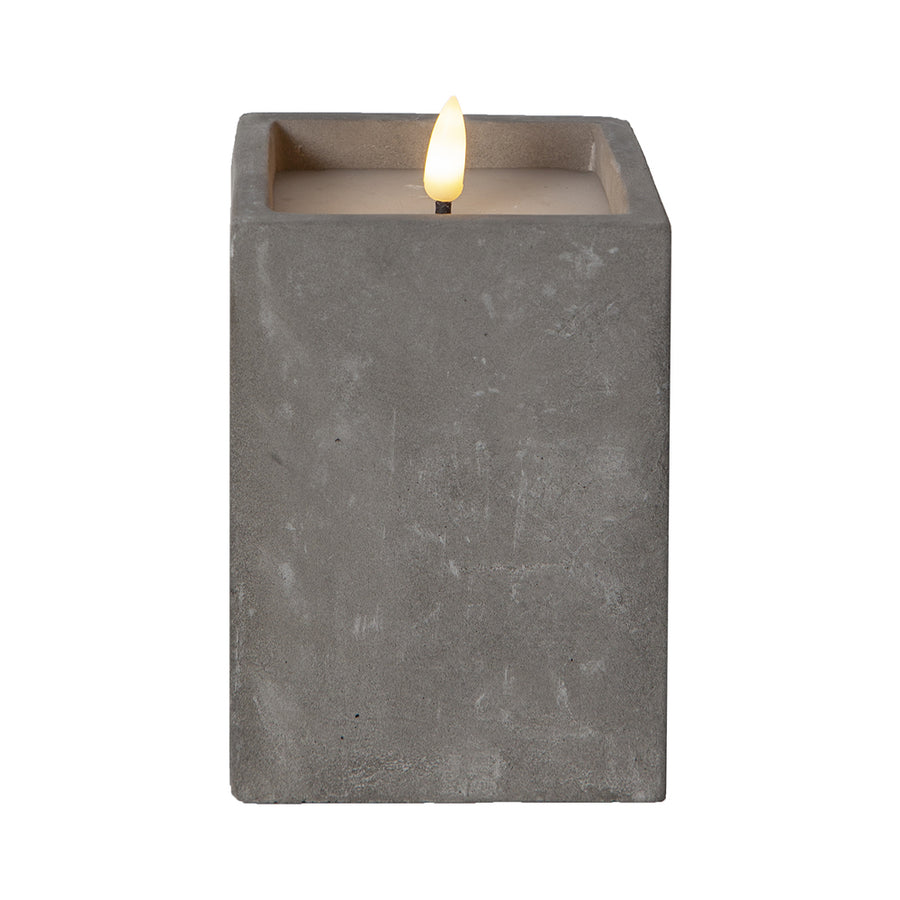 Szürke cement tégelyben kialakított LED gyertya.