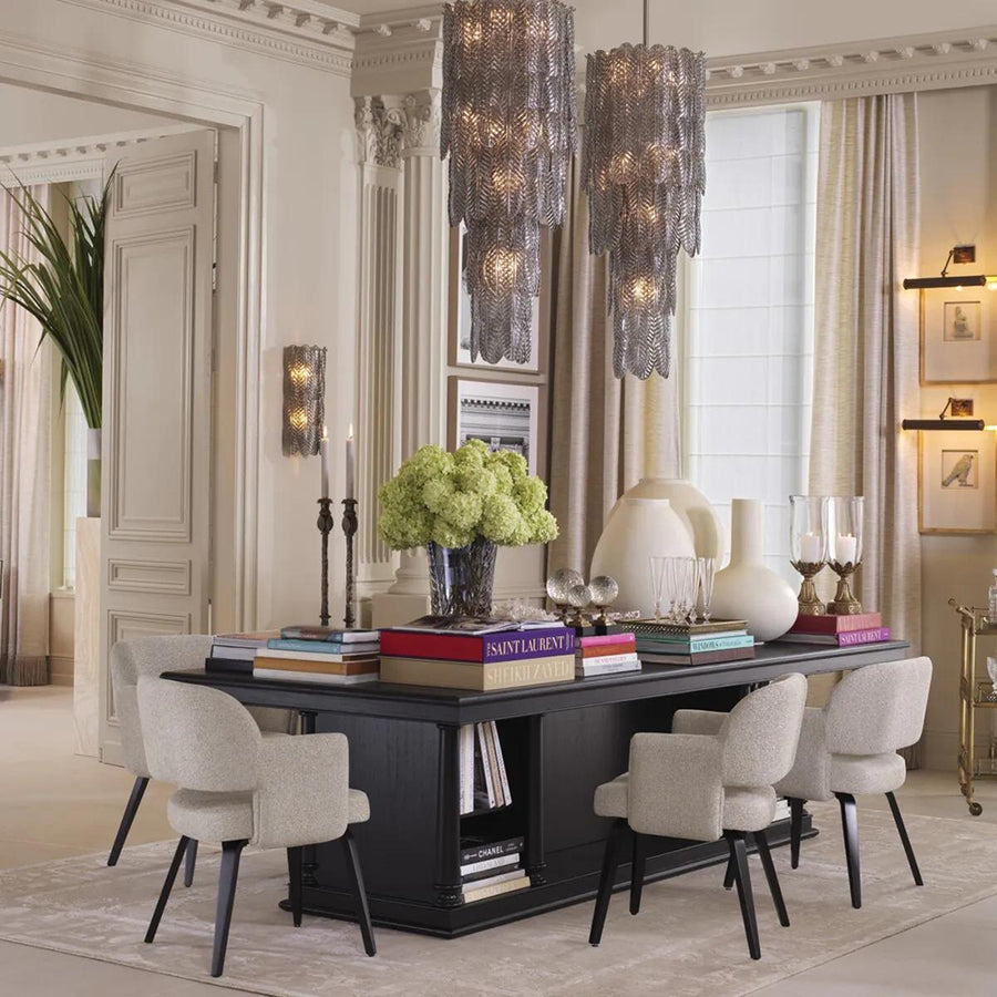 Fekete színű mindifa furnérból készült, formatervezett központi könyvtár asztal.