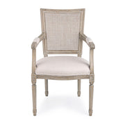 Bézs színű pamutvászonnal kárpitozott ülőfelülettel és szalma betétes háttámlával kialakított karosszék.