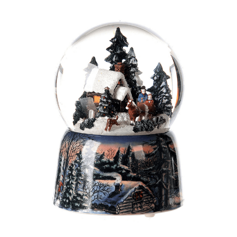 Karácsonyi zenélő-forgó hógömb, téli tájban suhanó lovas szánnal.