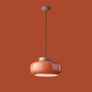 Piros színű formatervezett kortárs design lámpa.