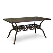 Bronzszínű fém kerti asztal.