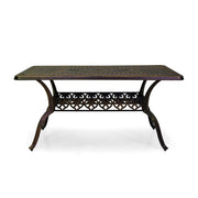 Bronzszínű fém kerti asztal.