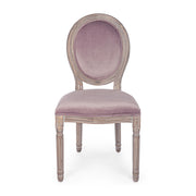 Púderrózsaszín színű, bársony hatású szövettel kárpitozott étkezőszék.