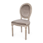 Taupe színű, bársony hatású szövettel kárpitozott étkezőszék.