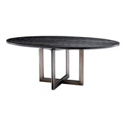 Faszénfekete színű tölgyfurnérból és bronz felületű rozsdamentes acélból készült, ovális formájú design étkezőasztal.