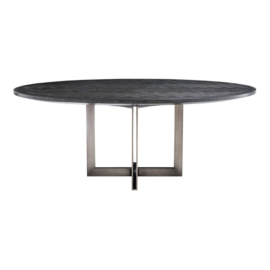 Faszénfekete színű tölgyfurnérból és bronz felületű rozsdamentes acélból készült, ovális formájú design étkezőasztal.