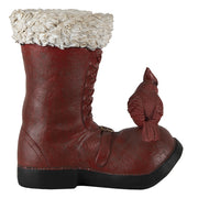 Kardinálispinttyel díszített, bordó színű mikulás csizma.