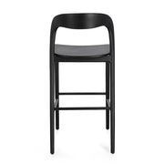 Fekete színű, teakfából ;készült, formatervezett bárszék.