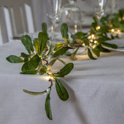 Világító mű fagyöngy girland ünnepi asztaldíszként meleg fehér LED fényekkel