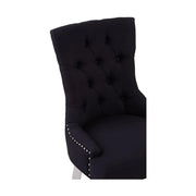 Ezüstszínű, rozsdamentes acéllábbakon álló, fekete színű poliészter vászonnal kárpitozott dizájn étkezőszék.