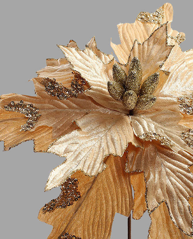 Pezsgőszínű bársonyból készült dekoratív mű mikulásvirág.