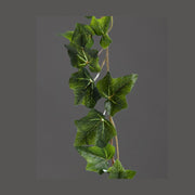 Borostyán girland műnövény.