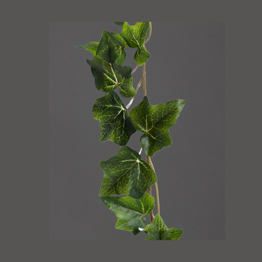 Borostyán girland műnövény.