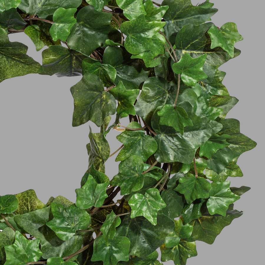 Zöld színű, mű borostyán koszorú.