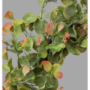 Virágzó, dús kialakítású, mű eukaliptusz koszorú.