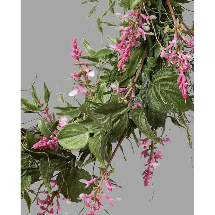 Rózsaszín virágzatú mű levendula koszorú.