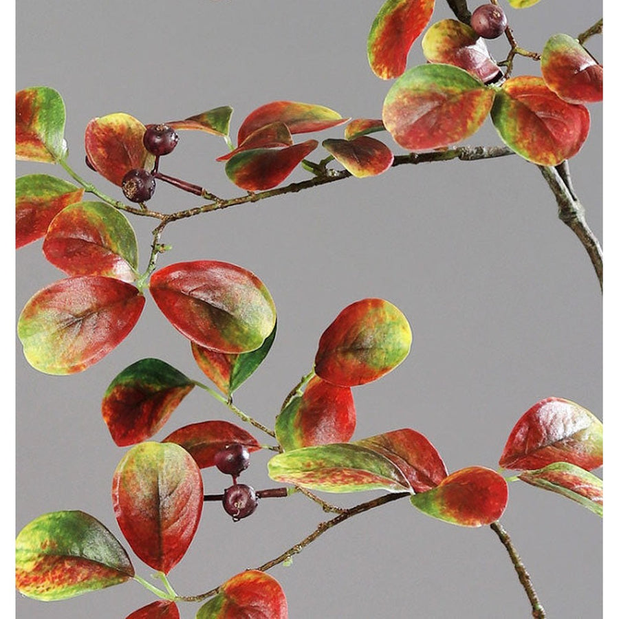 Hervadó levelű mű őszi bogyós lombhullató ág.