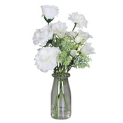 Krémszínű, vegyes művirágokból készült kompozíció, áttetsző üvegvázában..