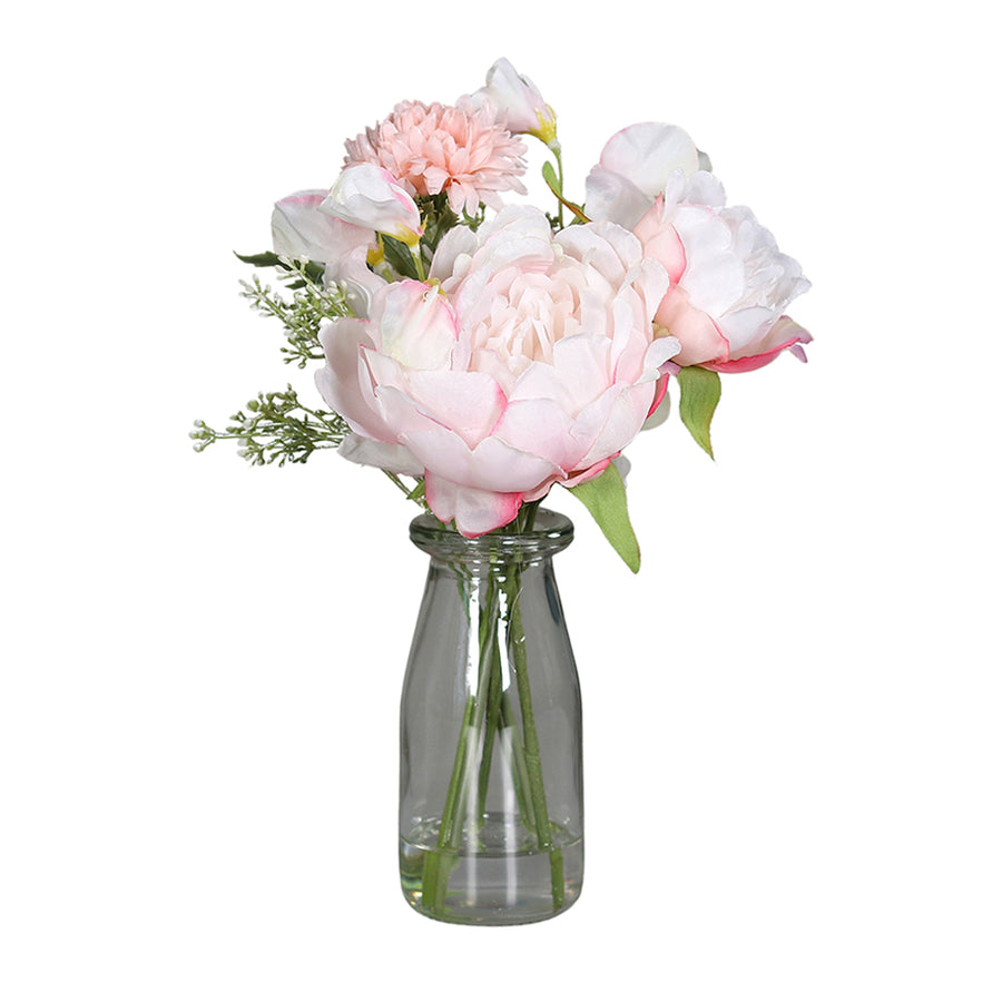 Rózsaszín színű, vegyes művirágokból készült virágcsokor, áttetsző üvegvázában..