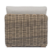 Barna színű műrattanból készült kerti fotel, levehető bézs színű ülő és hátpárnával.