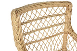 Rattan karosszék, fehér ülőpárnával.