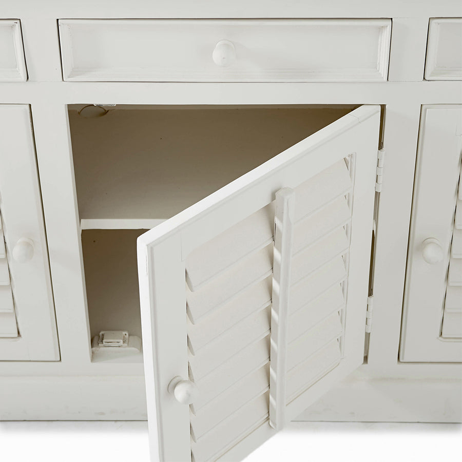 Fiókos tálalószekrény részlet fehér fa felülettel