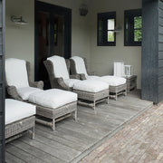 rattan lábzsámoly kültéri teraszon fotellel