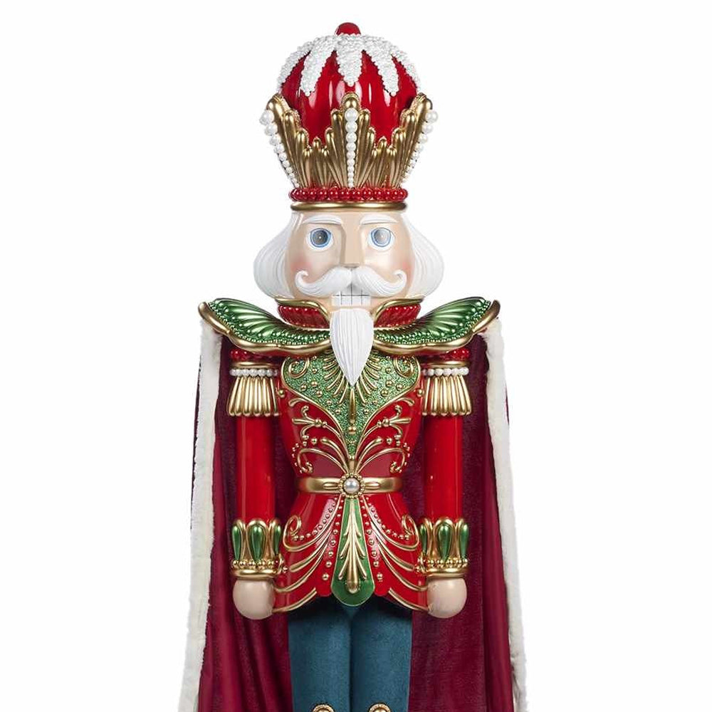 Óriás diótörő figura piros arany koronával és zöld arany díszítésű öltözékkel