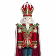 Óriás diótörő figura piros arany koronával és zöld arany díszítésű öltözékkel