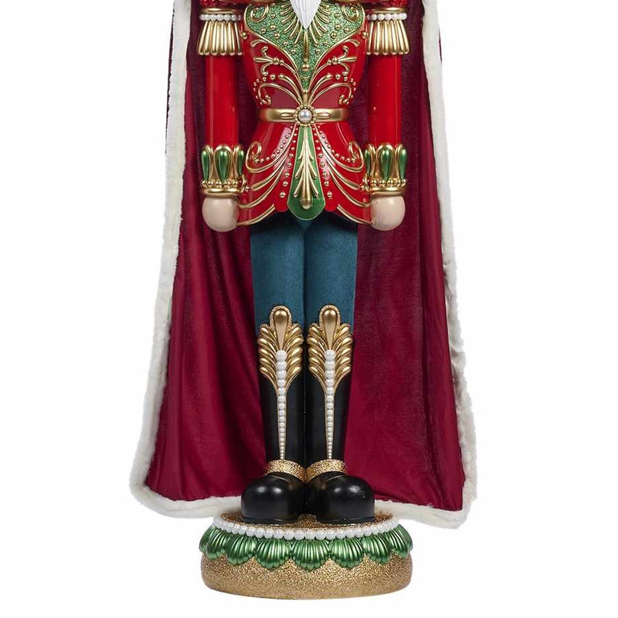 Goodwill bordó palástos diótörő figura fekete arany csizmával és díszes talapzattal